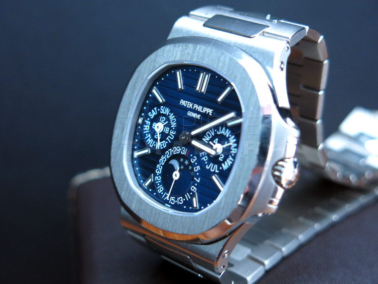 FACTORY SEALED PATEK PHILIPPE WHITE GOLD NAUTILUS WITH PERPETUAL CALENDAR  REF. 5740/1G WITH BOX AND PAPERS - Collectability